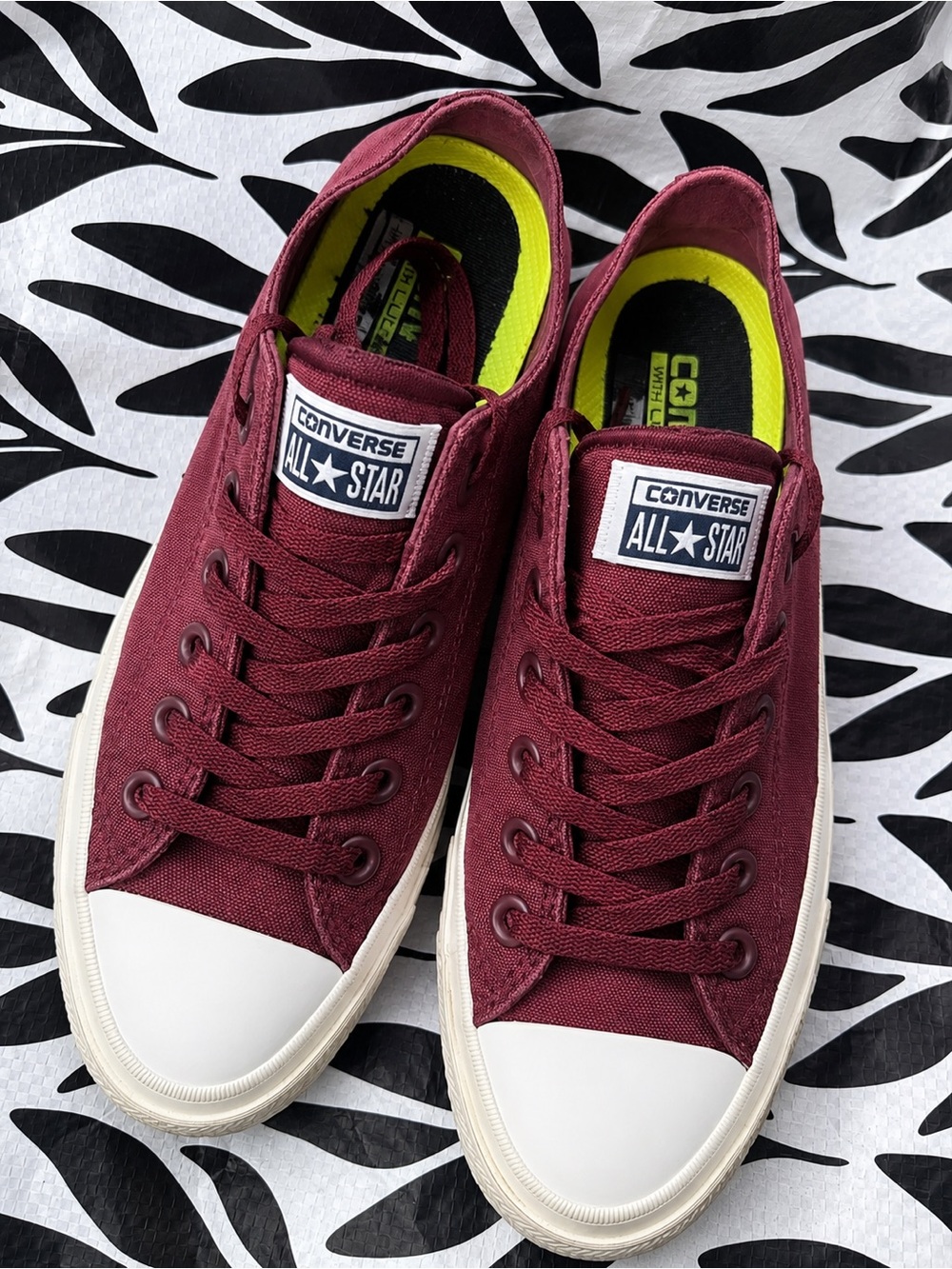 Converse Low Top Sneakers in Maroon and White